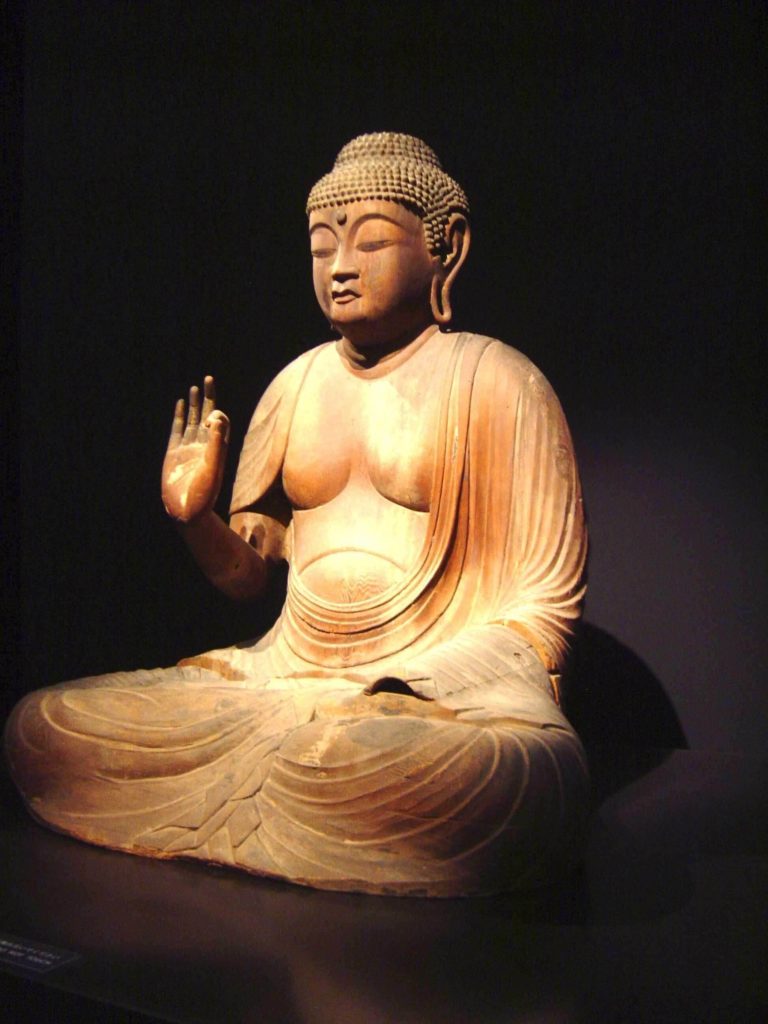 ancient wooden Buddha statue 